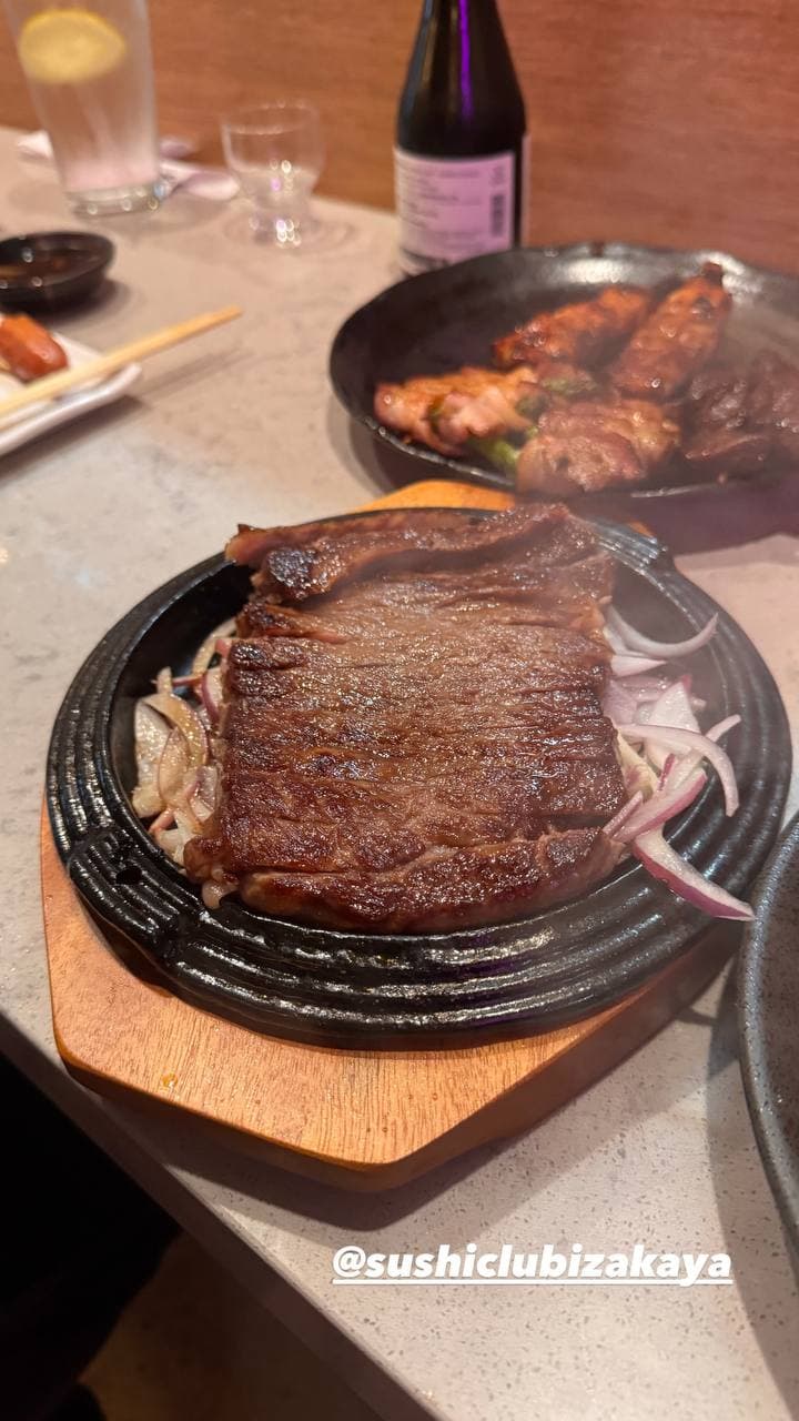 A5 Wagyu Ribeye skillet sizzling with sweet shoyu