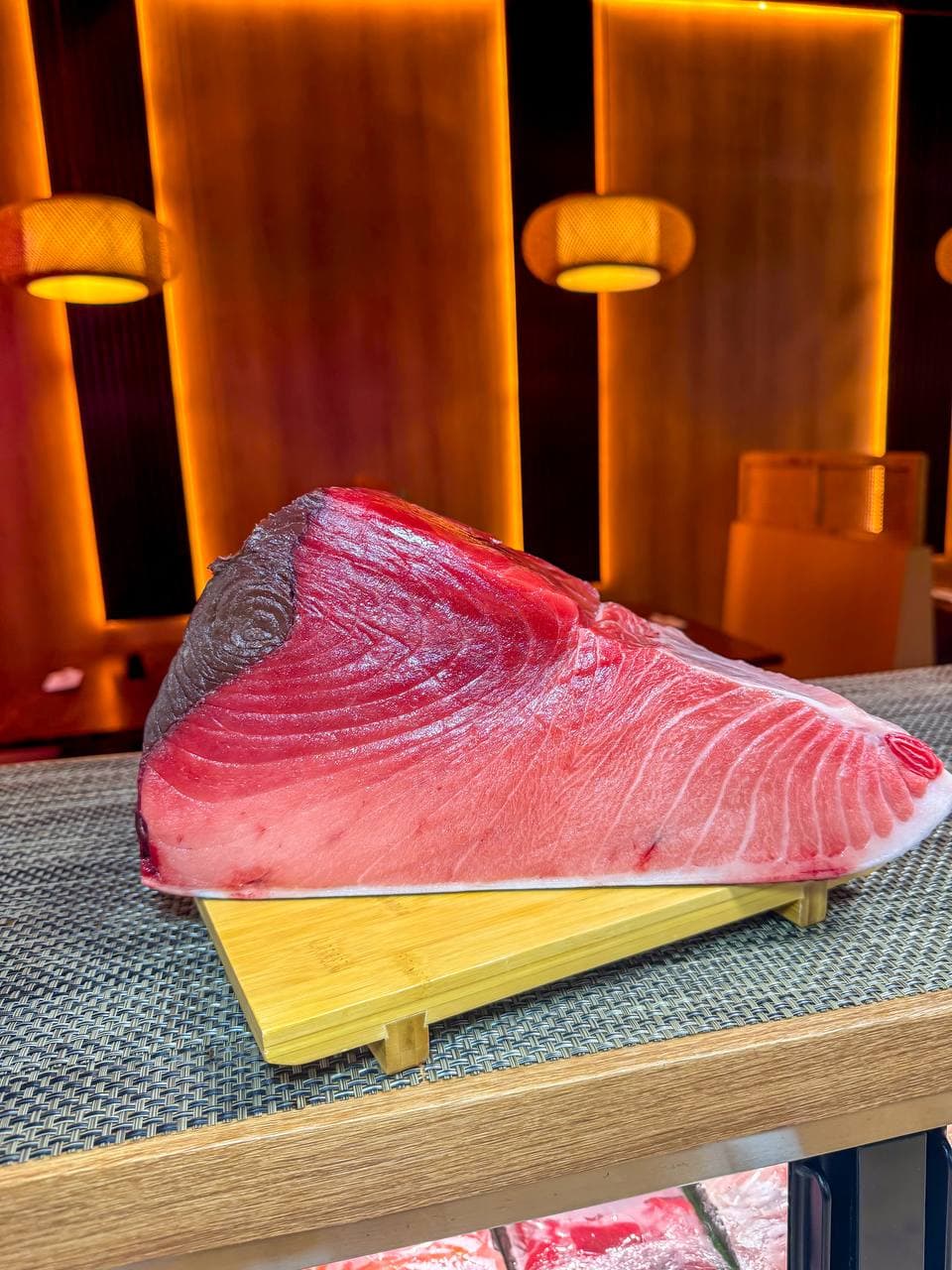 Prime bluefin tuna loin on sushi counter