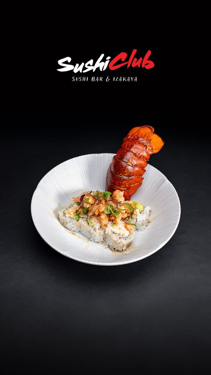Signature specialty roll with whole upright lobster tail
